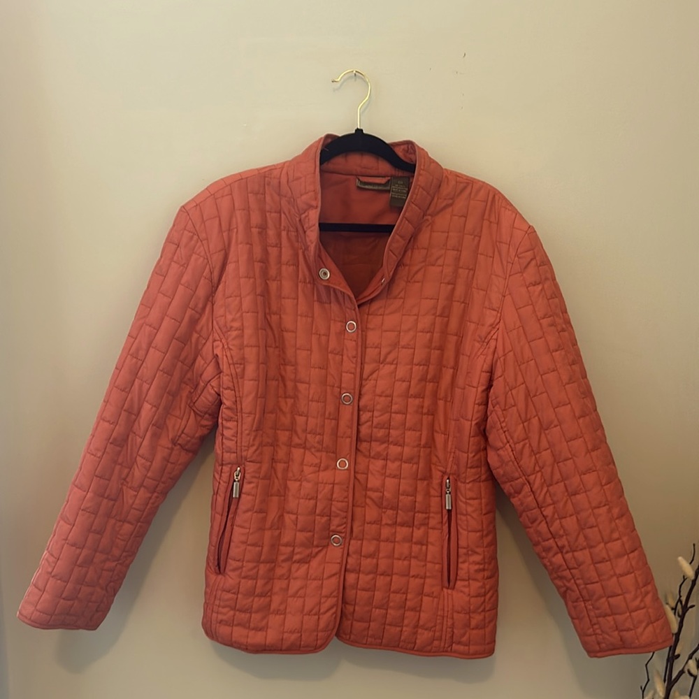 Light orange jacket with zippered pockets